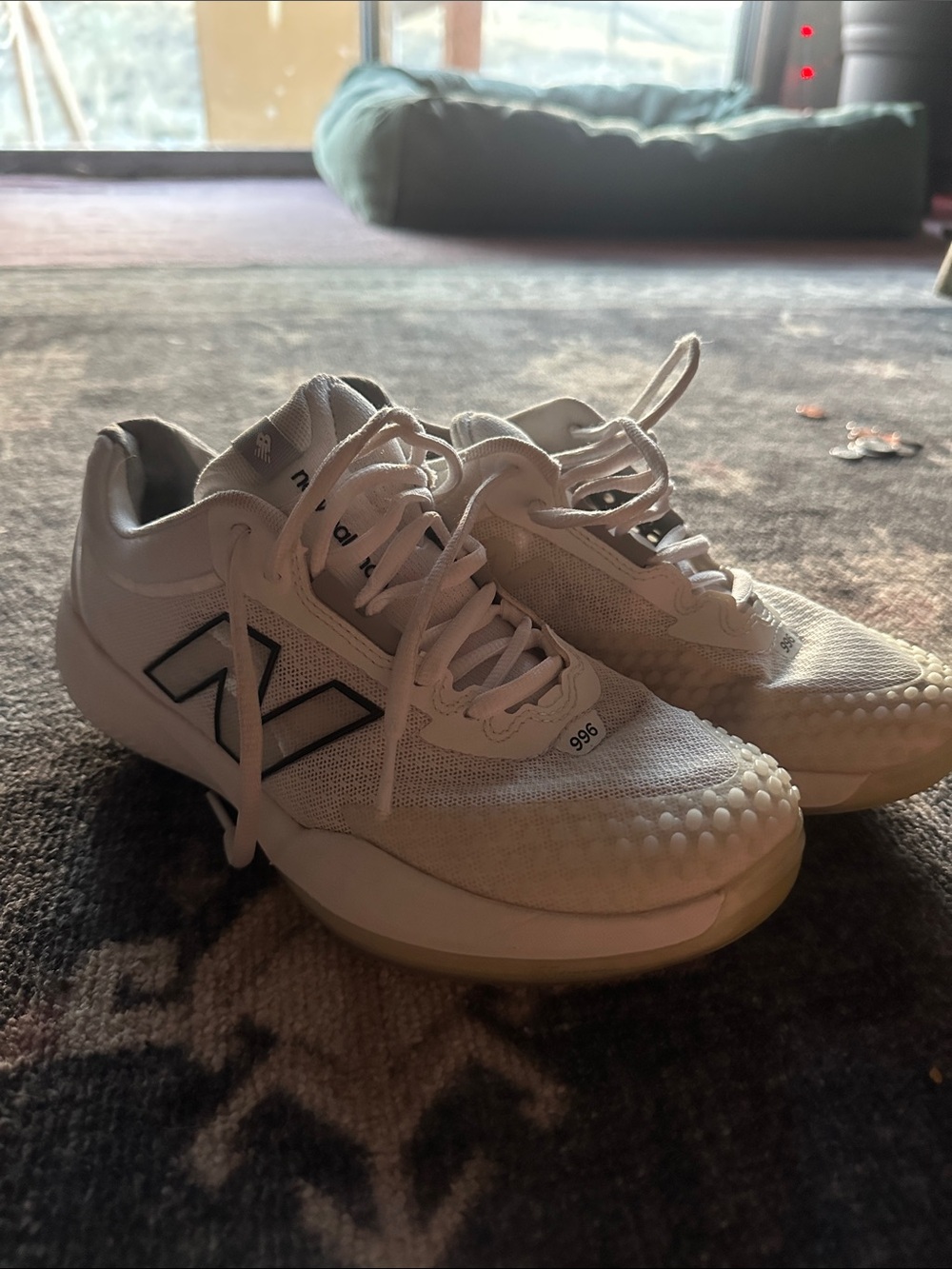 New Balance White Sneakers with Black Logo Accents